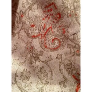 Vintage suede-feel grey fabric with orange swirls. French look yardage sewing